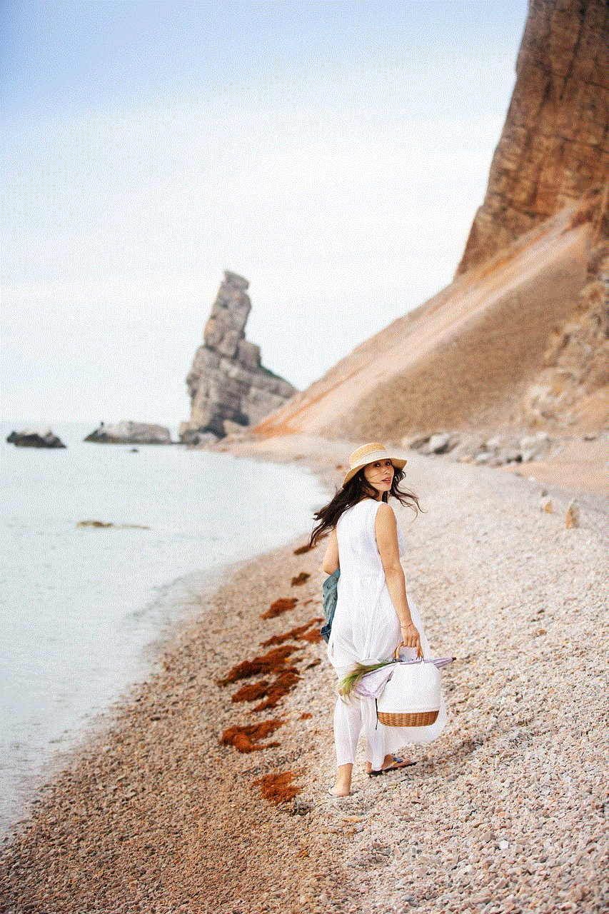 Woman Walking By The Beach